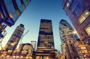 Tall buildings at night in city